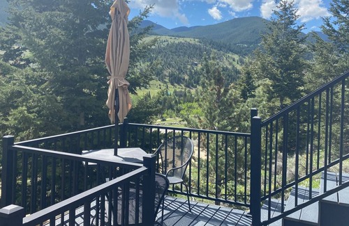 Red Lodge House | Our comfortable tiny cabin features Big amenities: Plush queen bed, galley kitchen, T.V., Internet, Fireplace & private bathroom, with shower & composting toilet. Large deck with seating areas, Bbq grill, table with umbrella & chairs. Plus lots of Vi