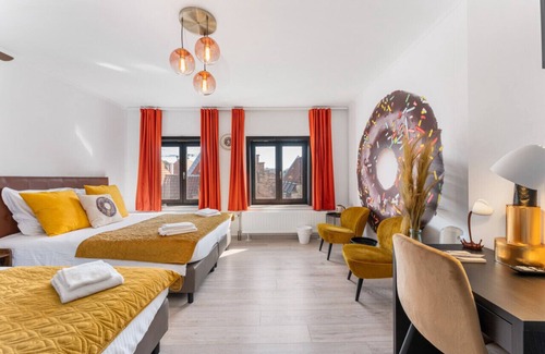 Historical Center Bruges Hotel | Our Giant Chocolate Donut Room by Homer Simpson - Perfect for up to 4 guests.
