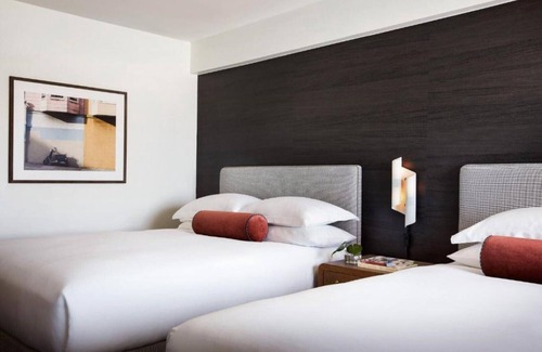 Fisherman's Wharf House | Our guestrooms are bright and cheerful, pops of jewel-toned fabrics and stylish!