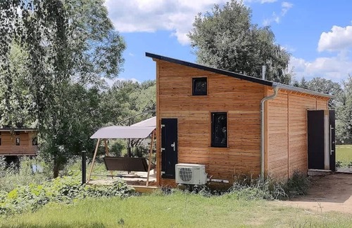 Buhlau House | Our largest tiny house - TinyHouse between the ponds. Large terrace, wood-burnin