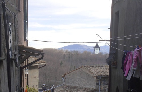 Latera Apartment | OUT OF THE OVEN. In the ancient village a cozy stone house on two levels.