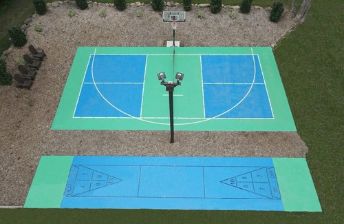 Honey Brook House | Outdoor Oasis with pickleball, swimming pond, basketball, shuffleboard & pavilion with kitchen