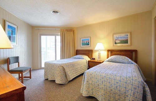 Kill Devil Hills Resort | Outer Banks Beach Club charming oceanside resort with private beach and pools