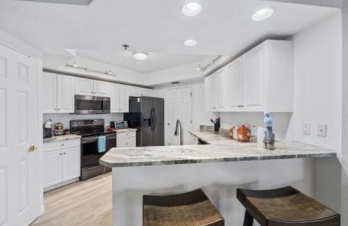 New Smyrna Beach Apartment | OW11-302 Oceanwalk Condo with Pond Views, Sunrises, and Resort Amenities