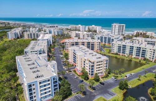 New Smyrna Beach Apartment | OW11-302 Oceanwalk Condo with Pond Views, Sunrises, and Resort Amenities