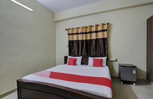 RR Nagar Hotel | OYO 27781 Sri Sai Comforts