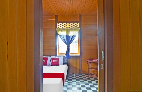 Manado City Centre Hotel | OYO 91246 Pulisan Ekowisata Homestay Near Wisata Pantai Desa Pulisan (Pulisan Beach Tour)