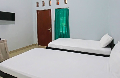 Kecamatan Janapria Hotel | OYO 92095 Wisma Dhana Syariah
