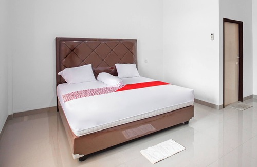 Jambi Hotel | OYO 92587 Homestay Romauli Kampung Radja