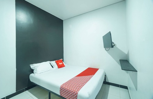Duren Sawit Hotel | OYO 93133 Hotel Moraja Near Stikes Abdi Nusantara