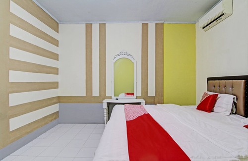 Pekanbaru Hotel | OYO 93206 Penginapan Budi SyariahNearTaman Amaryllis Pekanbaru