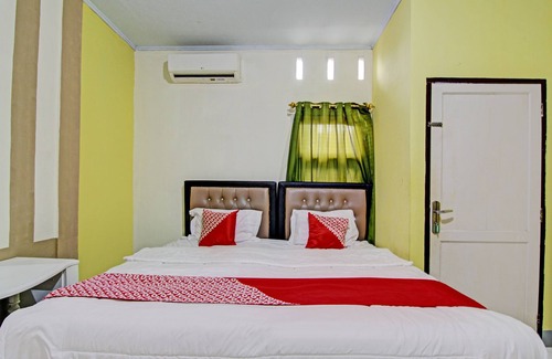 Pekanbaru Hotel | OYO 93206 Penginapan Budi SyariahNearTaman Amaryllis Pekanbaru