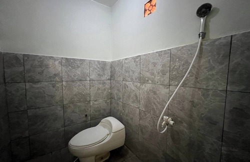 Mengwi Hotel | OYO 94014 The Sanya Homestay