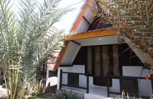 Tanjung Hotel | OYO Life 93125 Kos Bale Lumbung Syariah