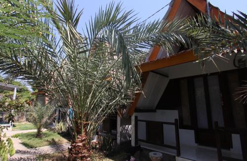 Tanjung Hotel | OYO Life 93125 Kos Bale Lumbung Syariah
