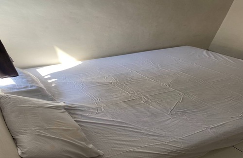 Tanjung Hotel | OYO Life Kos Bu Luh Mangku