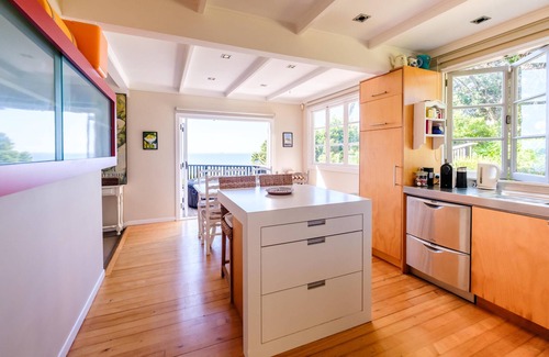 Palm Beach Cottage | Palm Beach Cottage - Palm Beach Cottage is a charming and beautifully decorated holiday cottage with one of the most stunning views on the island. With a king bed, a queen bed and a bunk room this is perfect for families to enjoy time together on the