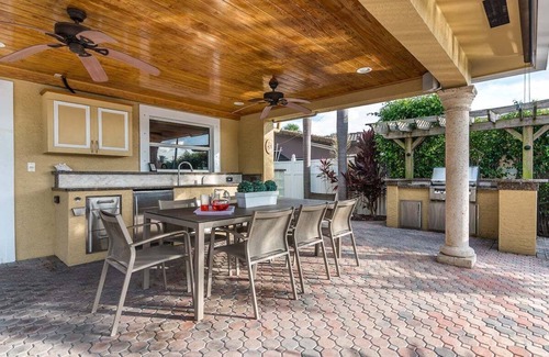 Garden Isles House | Palm Villa: New Remodel/Waterfront/Salt Water Pool!