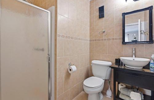 Crescent Beach Apartment | Palm Villa with Oceanfront Balcony, Pool, Sleeps 6