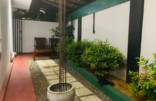 Kochchikade House | Palmwood Cottages with Private Kitchen Near Airport