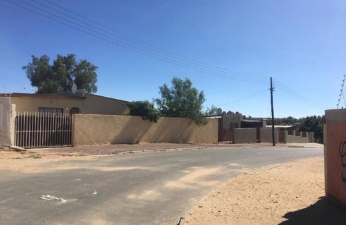 Windhoek House | Pandeinge - Family Room with Bathroom