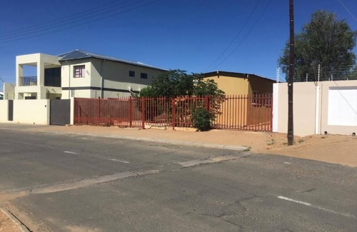 Windhoek House | Pandeinge - Family Room with Bathroom
