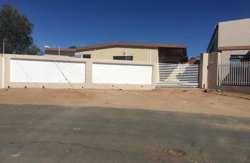 Windhoek House | Pandeinge - Family Room with Bathroom