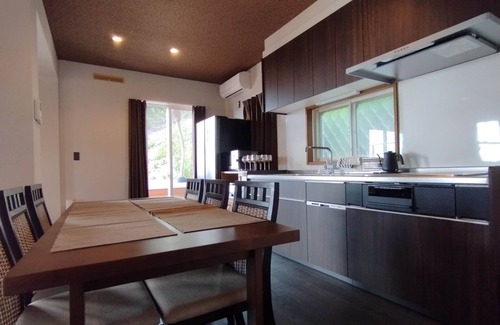 Sumoto House | Panoramic view of the ocean with a sunset view En/Sumoto Hyōgo