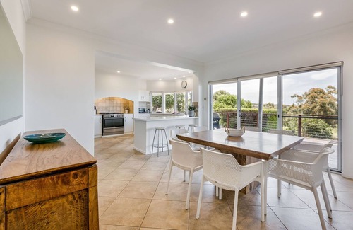 Eagle Bay House | PANORAMIC VISTAS OF THE PRISTINE COASTLINE & TURQUOISE WATERS OF EAGLE BAY.