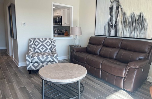 Mid America Condo | Paradise Found: Condo Oasis Reveals Stunning Pool and Lake Views!"