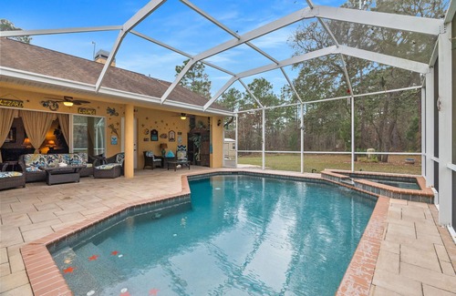 Brooksville House | Paradise found! Private heated pool spa . 3700 sq ft of luxury on 2+ acres!