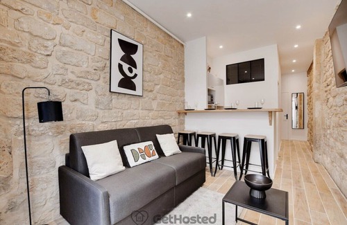 Quartier de la Porte-Saint-Denis Apartment | Paris Hideaway: Private Cinema – GetHosted