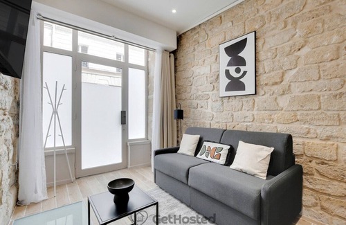 Quartier de la Porte-Saint-Denis Apartment | Paris Hideaway: Private Cinema – GetHosted