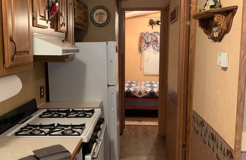 Boulder Junction Cabin | Parkmodel cabin w screened porch in campground on bike trail.