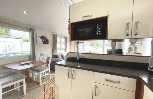 Beattock House | Pass the Keys | Charming and Cosy Holiday Home in Beautiful Park