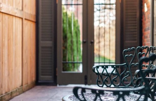 Stratford Apartment | Patio Suite with Sunroom | by Henry House Stays