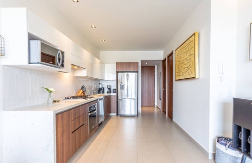Bucerias Condo | PAVILION 2BR, Rooftop Infinity Pool & Jacuzzi with AMAZING views of the ocean.