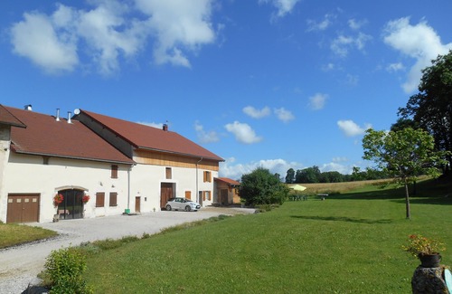 Saugeot Ski Chalet | Peace and space for this magnificent renovated farmhouse with fireplace.