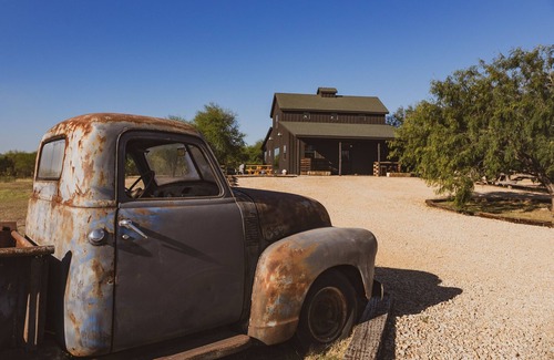 New Braunfels House | Peaceful Cabin Escape on a 65-Acre Longhorn Ranch