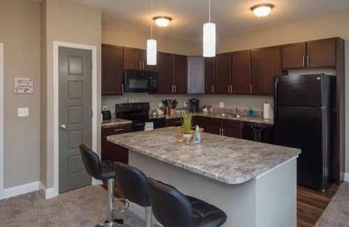 West Des Moines Apartment | Peaceful Getaway-Pool Access, Attached Garage, Gym
