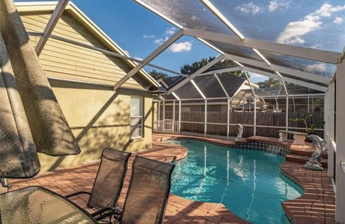 Town 'n' Country House | Peaceful Pool Home Near Airport Heated pool