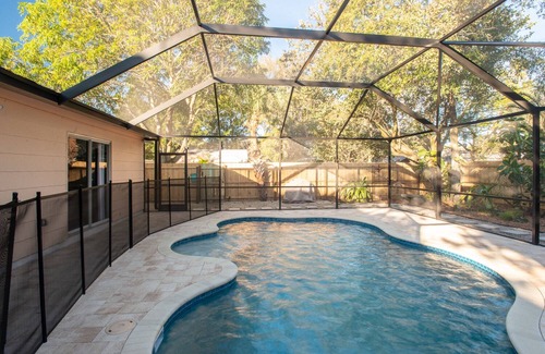 Gulfport House | Peach Hideaway - Caged, Heated Pool & Florida Room