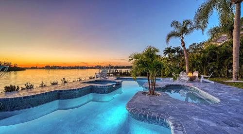 San Remo House | Pearl on the Bay - A breathtaking Pool & Bayfront property - an unparalleled vacation experience