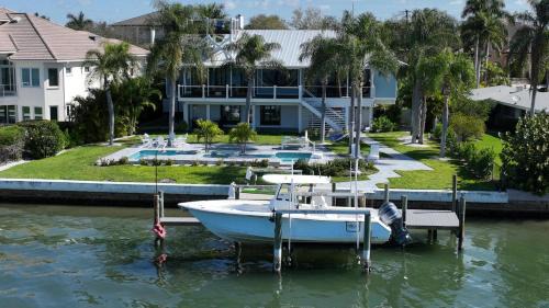 San Remo House | Pearl on the Bay - A breathtaking Pool & Bayfront property - an unparalleled vacation experience
