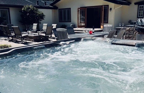 Del Monte Forest House | Pebble Beach Retreat with outdoor gas firepit and hot tub
