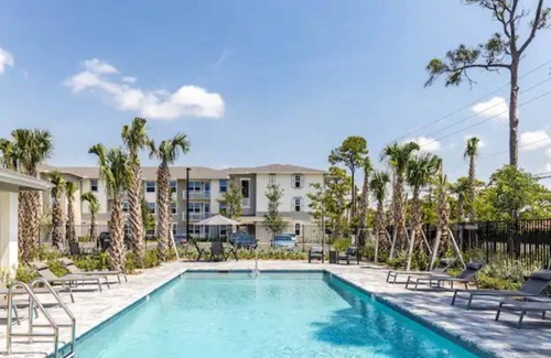 Greenacres Apartment | 'penta' at Aviara Green - Modern Apartment & Pool