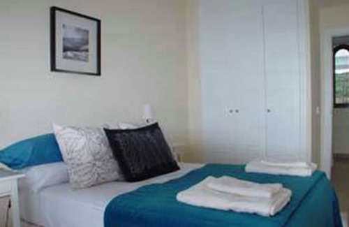 San Roque House | Penthouse in La Alcaidesa with Great Views, Shared Pool, A/C & Wi-Fi