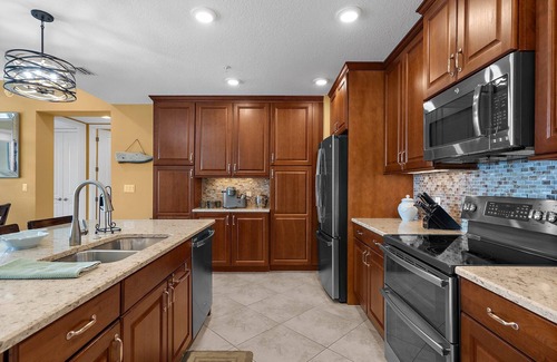Whitney Beach Condo | ⚓Penthouse Retreat! Coastal Condo 1 mile to AMI & Beaches⚓