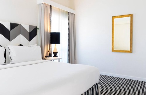 Norma Triangle Hotel | Penthouse View, Four Spacious Units in West Hollywood! Rooftop Heated Pool!