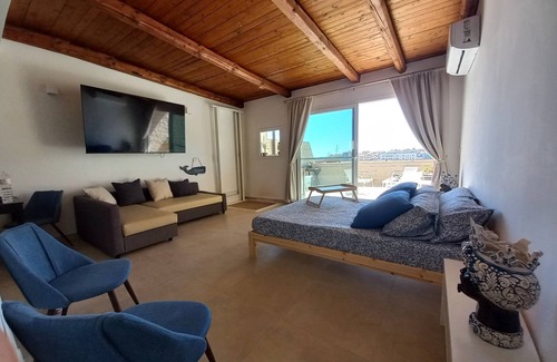 Eastern Sicily House | Penthouse with terrace, sea front overlooking Ortigia and its monuments.